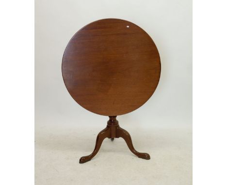 A 19th century mahogany tilt top circular occassional table on turned column and triple cabriole supports 