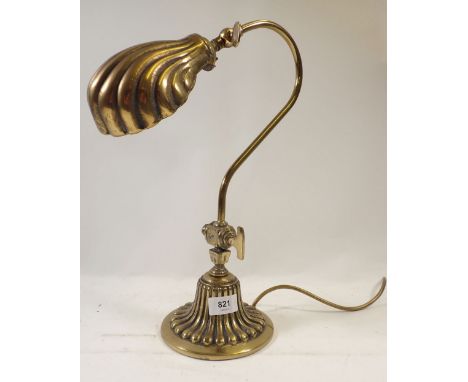 A brass reproduction table lamp with shell form shade, 39cm high 