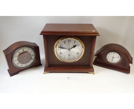 A mahogany cased Westminster chime mantel clock with pendulum, 28cm tall, a Smiths 8 day mantel clock and another 8 day mante