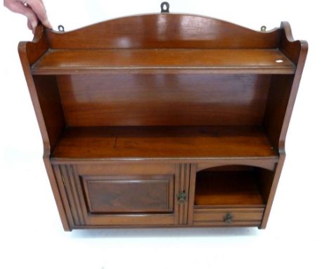 An Edwardian mahogany small wall shelf with drawer and cupboard, 63 x 62cm 