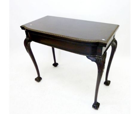 A mahogany Chippendale style fold top card table 