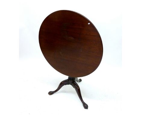 A George III mahogany circular tilt top occasional table with bird cage action on turned column and triple cabriole supports 