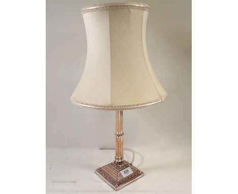A silver plated column form table lamp, 27cm high 