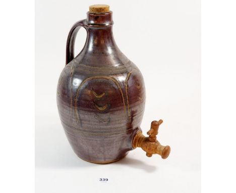 A Winchcombe pottery sherry flagon by Tom Jones, 30cm tall 