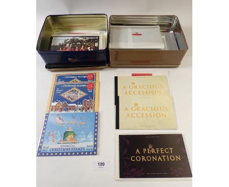 GB: Two tins of QEII 'Prestige' booklets, 1972-2005; many with 1st, 2nd and 'E' stamps within them. FV £450+. Incl 3 x 1999 "