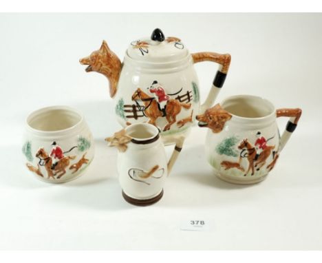 A fox hunting teapot, jug, smaller jug and sugar 