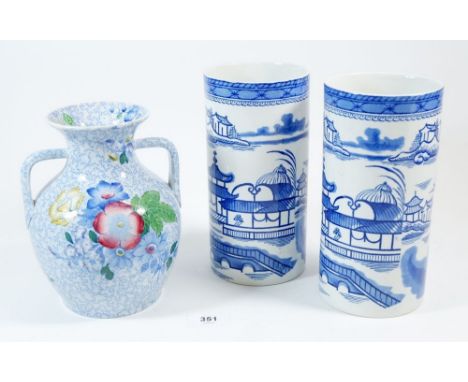 A Spode two handled floral vase, 18cm and a pair of Ashworth blue and white vases 