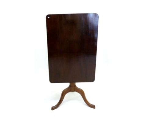 A 19th mahogany tilt top rectangular occasional table on turned column and triple cabriole supports 