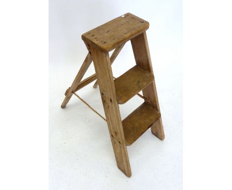 A vintage wooden step ladder 