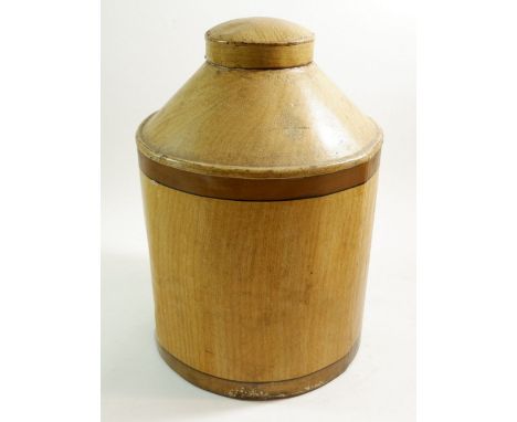 A large tin tea caddy, enamelled with a wood grain pattern, 35cm tall 