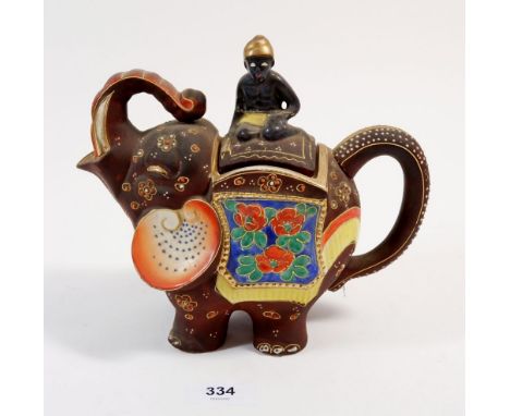 A novelty oriental elephant teapot