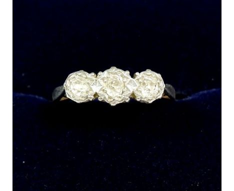 An 18 carat gold platinum ring set three diamonds, size N to O 