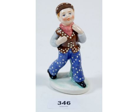 A rare Hummel figure of a boy with polka dot trousers, cap and jerkin 