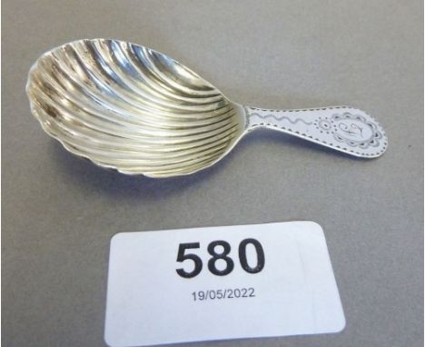 A George III silver shell bowl caddy spoon with bright cut decoration, 1788 by George Winkle 