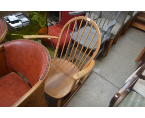 An Ercol stick back rocking chair