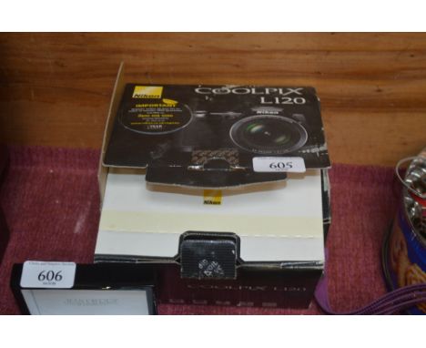 A Nikon Coolpix L120 camera with original box and user manuals 