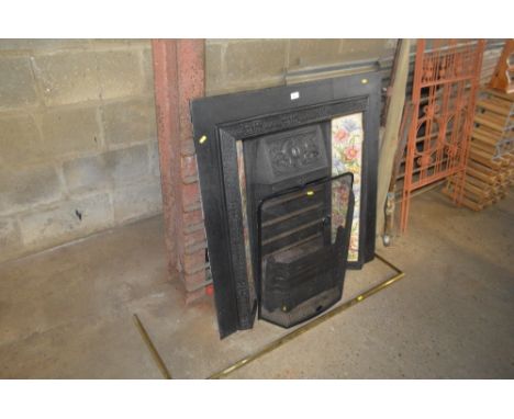 A Victorian style fireplace together with a spark guard; fire grate and curb