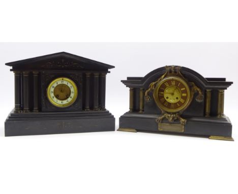 Victorian slate mantle clock of architectural form, with gilt face set on to an ormolu tiger, together with another similar V