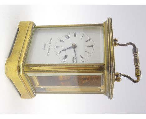 20th century Matthew Norman brass and bevel glazed carriage clock, white enamel Roman dial, the reverse inscribed 'Matthew No