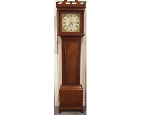 Early 19th century 30 hour mahogany long case clock by T Gilbert of Beckley, swan neck pediment, enamel face with painted flo