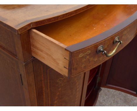 Edwardian inlaid mahogany bow front music cabinet, stepped arched raised back, single drawer above two panelled doors enclosi