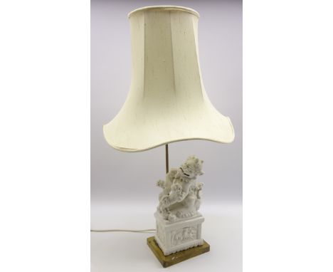 Blanc de chine table lamp in the form of a Chinese guardian lion with pagoda shape shade H80cm overall Condition Report & Fur