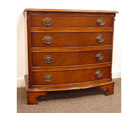 Small reproduction mahogany four drawer bow front chest, cross banded moulded top over four long graduating drawers, canted r