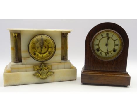 19th century Ansonia white onyx mantle clock, brass Roman dial, glazed door flanked by two fluted columns, with ormalu mount 