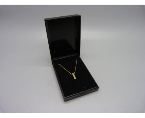 An 18ct gold and diamond pendant and chain, 3.6g, chain 38cm 