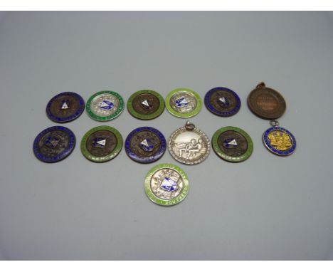 A 1930's silver Life Saving medallion, three silver and enamel medallions and nine other medallions, three inscribed to R. Pe
