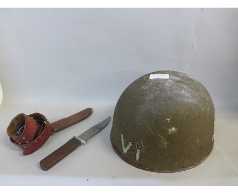 A helmet, lacking liner, and knife with scabbard 