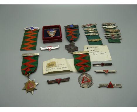 A collection of Driving Safety medallions including one silver and year bars, named to J. Bayley chauffeur to GWR Chairman, a