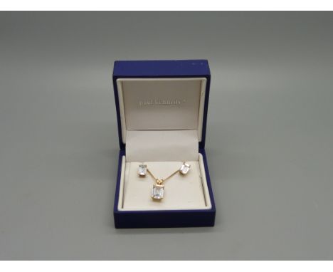 A silver gilt pendant, chain and earring set 