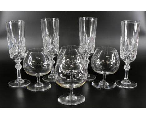 A set of four Baccarat brandy glasses, and a set of four Baccarat champagne flutes **PLEASE NOTE THIS LOT IS NOT ELIGIBLE FOR