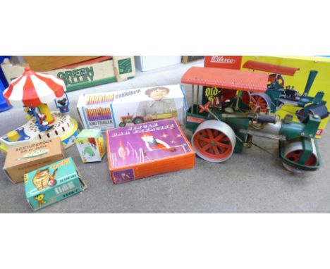 A Wilesco West German Old Smoky D36 steam roller, a Czechoslovakia tractor and trailer vintage toy, a Bar Exercise toy, and a