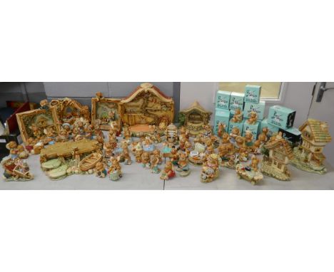 A very large collection of Pendelfin figures and large Pendelfin display stands including toy shop, landing stage and Cobble 