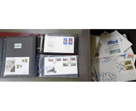 Stamps; a large box of first day covers, loose and in albums 