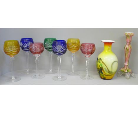 Seven etched coloured hock glasses, a coloured glass candlestick and vase **PLEASE NOTE THIS LOT IS NOT ELIGIBLE FOR POSTING 