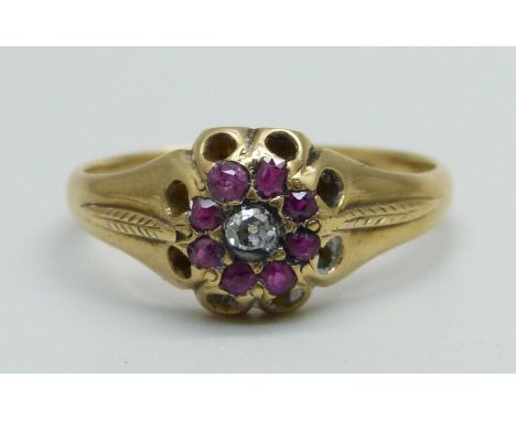 A Victorian 15ct gold, ruby and diamond cluster ring, Birmingham 1868, 2.3g, M/N 