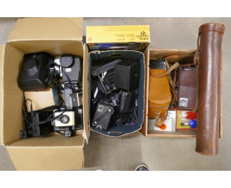 Three boxes of vintage cameras including Polaroid, box Brownie, tripod in leather case, etc. **PLEASE NOTE THIS LOT IS NOT EL
