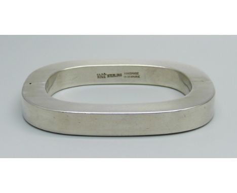 A Danish K. Laursen 925 sterling silver hinged bangle, 1968, marked Ka.La. Handmade in Denmark, 49.3g 