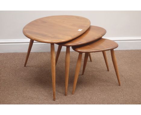 ercol pebble nest of three tables, elm tops, tapering splayed supports, W65cm Condition Report Click here for further images,