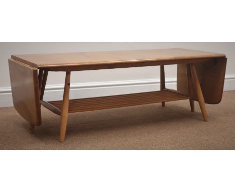 ercol elm coffee table, rectangular top with two drop leaves, magazine rack below, tapering supports, pullout action base, 10