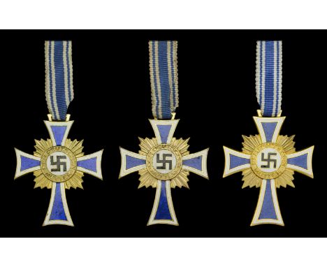 German Second World War Mothers Crosses in Gold. Three excellent condition Mother Crosses in gold, all cased, enamel to all t