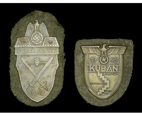 German Second World War Demjansk and Kuban Shields. A good used example of the Demjansk Shield still on its army grey green b