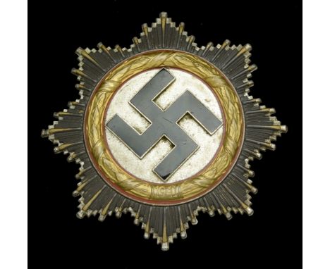 A German Second World War German Cross in Gold. A classic No.20 C.F. Zimmermann production, good gilt to the gold wreath with