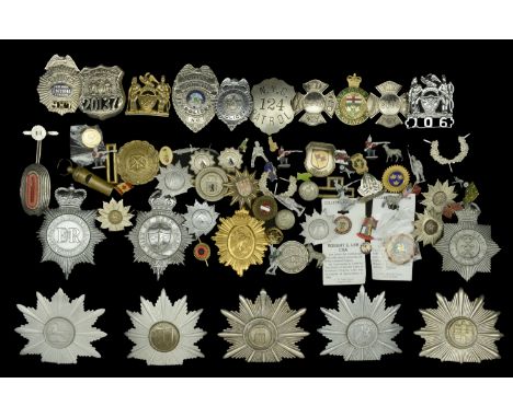 Miscellaneous Police Insignia. A miscellaneous selection, including Helmet Plates KC City of Bath, Hull, E.II.R. Devon & Corn