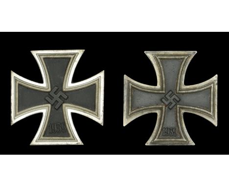 Two German Second World War Iron Crosses First Class. A superb example, flat construction, all original black finish to the c