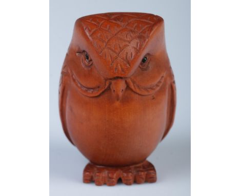 A Japanese carved Netsuke in the form of an owl  