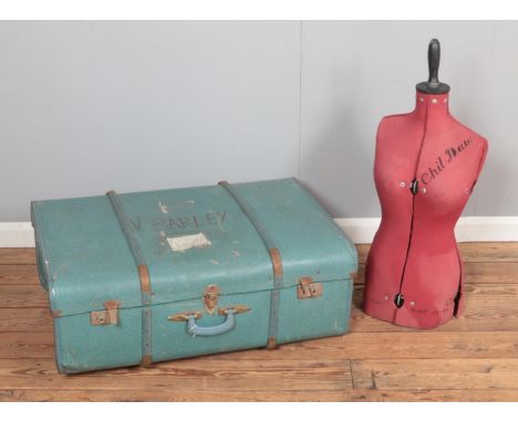 A vintage tailor's dummy, with 'Chil-daw' makers mark, together with a large wooden bound trunk.  Dent to the left side of th